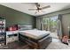 Spacious bedroom with a sliding glass door to the backyard patio at 3207 W Michigan Ave, Phoenix, AZ 85053