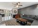 Comfortable living room featuring a ceiling fan and a decorative rug at 3207 W Michigan Ave, Phoenix, AZ 85053