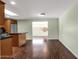 Bright kitchen featuring an island, skylight, and modern appliances at 3825 E Captain Dreyfus Ave, Phoenix, AZ 85032