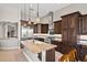 Spacious kitchen featuring a large island, stainless steel appliances, and ample cabinet space for storage at 41903 N Golf Crest Rd, Anthem, AZ 85086