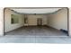 Spacious two-car garage with ample storage space and an automatic door opener at 41903 W Rojo St, Maricopa, AZ 85138