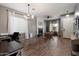 Open living room with a fireplace and an office area at 4413 W Phalen Dr, New River, AZ 85087