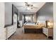 Bright main bedroom features a bay window, soft carpet, and neutral colors that create a calming retreat at 4413 W Phalen Dr, New River, AZ 85087