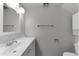Bathroom featuring new vanity and lighting with neutral decor at 4630 N 68Th St # 280, Scottsdale, AZ 85251