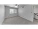 Clean and well-lit bedroom with carpet, a closet, and a ceiling fan at 4630 N 68Th St # 280, Scottsdale, AZ 85251