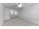 This bedroom features neutral carpet, a mirrored closet, and ceiling fan at 4630 N 68Th St # 280, Scottsdale, AZ 85251