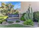 Well-manicured Camelback House Condominiums sign showcasing the community's lush landscaping at 4630 N 68Th St # 280, Scottsdale, AZ 85251