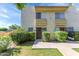 Charming condo exterior featuring well-maintained landscaping and inviting front entrances at 4630 N 68Th St # 280, Scottsdale, AZ 85251