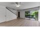 Bright living room with hardwood floors and sliding glass doors to patio at 4630 N 68Th St # 280, Scottsdale, AZ 85251