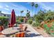 Enjoy the outdoor seating, colorful flowers, grill and lush landscaping by the condo at 4630 N 68Th St # 280, Scottsdale, AZ 85251