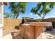Backyard featuring a built-in grill and counter, perfect for outdoor entertaining at 4662 S Calico Rd, Gilbert, AZ 85297