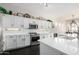 Bright kitchen features white cabinets and stainless steel appliances at 4662 S Calico Rd, Gilbert, AZ 85297