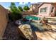 A sparkling pool and hot tub, perfect for relaxation and entertainment in the backyard at 4662 S Calico Rd, Gilbert, AZ 85297