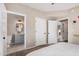 Spacious bedroom with ensuite bathroom and walk in closet at 5302 E Van Buren St # 2024, Phoenix, AZ 85008