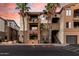 Beautiful condo building with desert landscaping, balconies, and attractive architectural details at 5302 E Van Buren St # 2024, Phoenix, AZ 85008