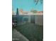 Backyard with partial fence and a small lawn at 5704 E Aire Libre Ave # 1038, Scottsdale, AZ 85254