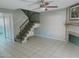 Living room featuring stairs and fireplace at 5704 E Aire Libre Ave # 1038, Scottsdale, AZ 85254
