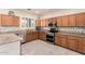 Updated kitchen featuring stainless steel appliances, granite countertops, and lots of cabinet space at 6118 S 46Th Ave, Laveen, AZ 85339