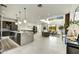 Spacious open concept design with kitchen, living, and dining areas with abundant natural light at 6525 E Cave Creek Rd # 101, Cave Creek, AZ 85331