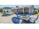 Spacious backyard with a pool, seating area, firepit, and patio furniture, perfect for outdoor living at 696 W Mesquite St, Chandler, AZ 85225