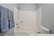 Bathroom with a tub, toilet, and shower at 696 W Mesquite St, Chandler, AZ 85225