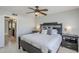 Bedroom features a bed with decorative headboard and bedside tables at 696 W Mesquite St, Chandler, AZ 85225