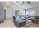 Bright and airy living room features vaulted ceilings, a large sectional sofa, and neutral decor at 696 W Mesquite St, Chandler, AZ 85225