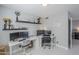 Home office with modern white desk and shelves at 696 W Mesquite St, Chandler, AZ 85225
