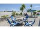Outdoor patio with an inviting fire pit and view of the pool at 696 W Mesquite St, Chandler, AZ 85225