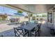 Inviting patio with a dining table, grill, and seating area, perfect for outdoor entertaining at 696 W Mesquite St, Chandler, AZ 85225