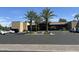 Attractive clubhouse exterior with lush landscaping and ample parking at 7222 E Gainey Ranch Rd # 232, Scottsdale, AZ 85258