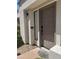 Charming front entrance with a stylish door and modern lighting at 7222 E Gainey Ranch Rd # 232, Scottsdale, AZ 85258