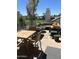Inviting patio with comfortable seating and views of the golf course at 7222 E Gainey Ranch Rd # 232, Scottsdale, AZ 85258