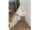 Bright staircase featuring wood treads and minimalist design at 7222 E Gainey Ranch Rd # 232, Scottsdale, AZ 85258