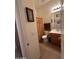 Cozy bathroom with vanity, toilet, and tiled shower curtain at 7227 W Paradise Ln, Peoria, AZ 85382