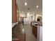 This kitchen features extensive granite countertops, wood cabinets, and stainless appliances at 7227 W Paradise Ln, Peoria, AZ 85382