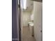 Functional laundry room featuring a washer, dryer, storage cabinets, and tiled floor at 7227 W Paradise Ln, Peoria, AZ 85382