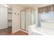 Bathroom features a large walk-in shower and a soaking tub at 728 E Windsor Dr, Gilbert, AZ 85296