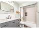 Renovated bathroom featuring a shower/tub combo and vanity at 728 E Windsor Dr, Gilbert, AZ 85296