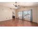 Primary bedroom with a ceiling fan and two windows for natural light at 728 E Windsor Dr, Gilbert, AZ 85296