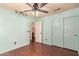 This bedroom features a ceiling fan, and a closet at 728 E Windsor Dr, Gilbert, AZ 85296