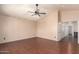 Spacious bedroom with ceiling fan and access to ensuite bathroom at 728 E Windsor Dr, Gilbert, AZ 85296
