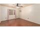 Bedroom with a window and ceiling fan at 728 E Windsor Dr, Gilbert, AZ 85296