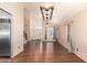 Inviting living room featuring high ceilings, hardwood floors, and natural light at 728 E Windsor Dr, Gilbert, AZ 85296