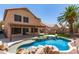 Backyard pool area with desert landscaping and covered patio, perfect for entertaining at 728 E Windsor Dr, Gilbert, AZ 85296