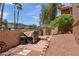 Cozy backyard with a brick-lined patio and desert landscaping at 841 E Peoria Ave # 2, Phoenix, AZ 85020
