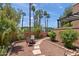 Inviting backyard featuring a stone pathway, desert landscaping, and a charming seating area at 841 E Peoria Ave # 2, Phoenix, AZ 85020