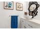 Stylish powder room with vessel sink, designer mirror, and modern fixtures at 841 E Peoria Ave # 2, Phoenix, AZ 85020