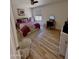 Bright bedroom with modern decor and wooden floors offers a peaceful retreat at 841 E Peoria Ave # 2, Phoenix, AZ 85020