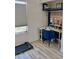 Cozy bedroom featuring a sleek desk area and modern laminate flooring at 841 E Peoria Ave # 2, Phoenix, AZ 85020